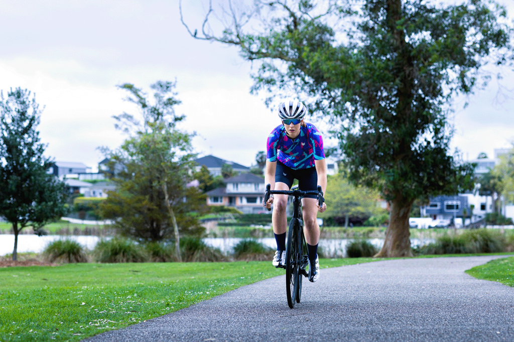 Emily cycling around Hamilton Lake